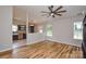 Living room featuring hardwood flooring, a ceiling fan, and view into the kitchen at 1312 Shenandoah Cir, Rock Hill, SC 29730
