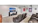 Finished basement featuring media seating, large screen TV, audio equipment, pennants, and carpeting at 1320 Torrens Dr, Wesley Chapel, NC 28110