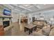 Bright, open-concept living area flows to dining and kitchen at 1320 Torrens Dr, Wesley Chapel, NC 28110