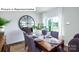 Stylish dining room with hardwood floors, trendy decor and a large window allowing ample natural light at 1341 Secrest Commons Dr, Monroe, NC 28112