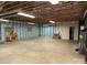 Spacious unfinished basement showcasing concrete floors, exposed ceiling, and insulated walls with finishing potential at 1519 Midland Dr, Hudson, NC 28658