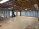 Expansive unfinished basement showcasing concrete floors, exposed ceiling, and insulated walls, ready to be transformed at 1519 Midland Dr, Hudson, NC 28658