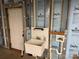 Functional unfinished basement sink with insulated walls, offering convenience and practical utility at 1519 Midland Dr, Hudson, NC 28658