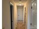 Hallway with neutral walls and carpet floors at 1519 Midland Dr, Hudson, NC 28658