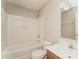 Bright bathroom featuring a tub and shower combination, vanity with sink, and a neutral color palette at 1522 Tuckers Glenn Dr, Rock Hill, SC 29732