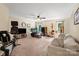 Spacious bonus room with home gym equipment, a seating area, and a desk at 1800 Robbins Meadows Dr, Waxhaw, NC 28173