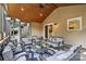 Inviting outdoor patio featuring stylish furniture and a ceiling fan for relaxation at 1800 Robbins Meadows Dr, Waxhaw, NC 28173
