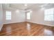 Spacious bedroom featuring hardwood floors, trey ceiling, and natural light at 198 Devon Forest Dr, Mooresville, NC 28115