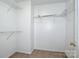 Walk-in closet with metal shelving and patterned floors at 198 Devon Forest Dr, Mooresville, NC 28115