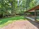 The home has a brick patio and a large backyard perfect for outdoor activities at 2104 Stoneyridge Dr, Charlotte, NC 28214