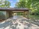 The house has a convenient carport with ample space for parking and storage at 2104 Stoneyridge Dr, Charlotte, NC 28214