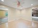 Bright dining room offers tile flooring and transitions to other rooms, perfect for gatherings at 2104 Stoneyridge Dr, Charlotte, NC 28214