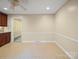Bright dining room features tile flooring and neutral paint, ready for personalized decor at 2104 Stoneyridge Dr, Charlotte, NC 28214