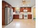 Open kitchen boasts stainless steel appliances, granite countertops, and ample cabinet space at 2104 Stoneyridge Dr, Charlotte, NC 28214