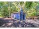 Beautiful blue two-story home with a fenced yard and mature trees, located on a peaceful, wooded lot at 2116 Bon Villa Way, Fort Mill, SC 29708