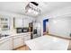 Bright kitchen featuring stainless steel appliances, an island, and modern lighting fixture at 2116 Bon Villa Way, Fort Mill, SC 29708