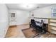 Office space with light walls, wood-look flooring, natural light, and an exterior entrance at 2116 Bon Villa Way, Fort Mill, SC 29708
