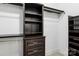Closet complete with shelving and drawers, offering ample space for all your personal belongings at 2411 Stoney Run Dr # 13, Oakboro, NC 28129