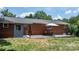 Charming outdoor patio with brick siding and a bistro set, creating a relaxing and inviting space at 2623 Ne 13Th Ne St, Hickory, NC 28601