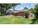 Well-maintained backyard with a brick house exterior and a cozy patio area for relaxing at 2623 Ne 13Th Ne St, Hickory, NC 28601