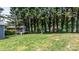 Spacious backyard featuring mature trees and a play area, perfect for outdoor activities and Gathering fun at 2623 Ne 13Th Ne St, Hickory, NC 28601