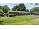 Well-maintained brick home with lush front lawn, traditional design, and convenient attached carport at 2623 Ne 13Th Ne St, Hickory, NC 28601