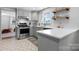 Well-equipped kitchen with modern appliances and hexagonal tile flooring at 2623 Ne 13Th Ne St, Hickory, NC 28601