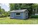Charming backyard shed with a window box, providing extra storage and a touch of character at 2623 Ne 13Th Ne St, Hickory, NC 28601