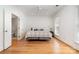 Bright bedroom with hardwood floors and a ceiling fan at 2825 Sharon View Rd, Charlotte, NC 28210