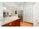 Open kitchen layout with stainless steel appliances and ample cabinet space at 2825 Sharon View Rd, Charlotte, NC 28210