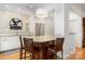 Kitchen island featuring granite countertops and seating with stainless steel appliances at 2825 Sharon View Rd, Charlotte, NC 28210
