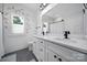 A modern bathroom with double sinks, vanity, and a shower tub combination at 333 Anne Ave, Waxhaw, NC 28173