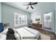 Virtually staged bedroom with furniture and connecting bathroom at 333 Anne Ave, Waxhaw, NC 28173