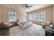 Bright bedroom featuring many windows, wood floors and a large area rug at 333 Anne Ave, Waxhaw, NC 28173