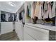 Spacious walk-in closet with custom shelving and drawers for optimal organization at 333 Anne Ave, Waxhaw, NC 28173
