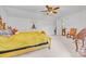 Bedroom with a ceiling fan and decorative furniture at 36433 Azalea Cir, New London, NC 28127