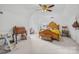 Bedroom with a ceiling fan and decorative wood furniture at 36433 Azalea Cir, New London, NC 28127