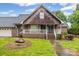 Charming single-Gathering home with brick and wooden siding at 36433 Azalea Cir, New London, NC 28127