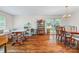 Spacious living room featuring hardwood floors and large windows at 36433 Azalea Cir, New London, NC 28127
