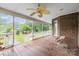 Covered porch featuring a ceiling fan and view of the outdoors at 36433 Azalea Cir, New London, NC 28127