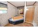 Cozy bathroom features a soaking tub, adjacent standing shower, and bright natural lighting at 4171 Leatherman Rd, Vale, NC 28168