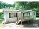 Charming single-story home with a wooden deck and landscaped yard at 4171 Leatherman Rd, Vale, NC 28168