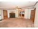 Open living room with a fireplace and views of the kitchen and hallway at 4171 Leatherman Rd, Vale, NC 28168