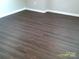 Empty room featuring hard wood floors and white trim at 5855 Amity Springs Dr, Charlotte, NC 28212
