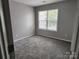 Bedroom with hardwood floors and natural light at 5855 Amity Springs Dr, Charlotte, NC 28212