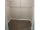 Empty closet with wire shelving and carpet at 5855 Amity Springs Dr, Charlotte, NC 28212