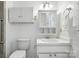 Clean bathroom featuring a vanity, toilet, and ample storage space at 6319 Welford Rd, Charlotte, NC 28211