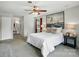 Serene main bedroom with soft lighting, calm colors, and a decorative nautical painting at 6319 Welford Rd, Charlotte, NC 28211