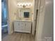 Modern bathroom featuring a large vanity with drawers and a bath and shower combo at 709 Falls Church Rd, Charlotte, NC 28270