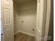 Walk-in closet features built in shelf and open floor space at 709 Falls Church Rd, Charlotte, NC 28270